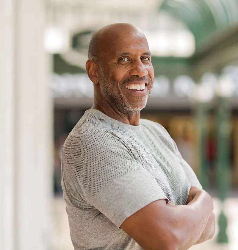 African American man in his 40s smiling